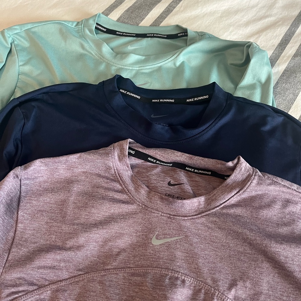 Three NIKE running Sri fit long sleeve tees